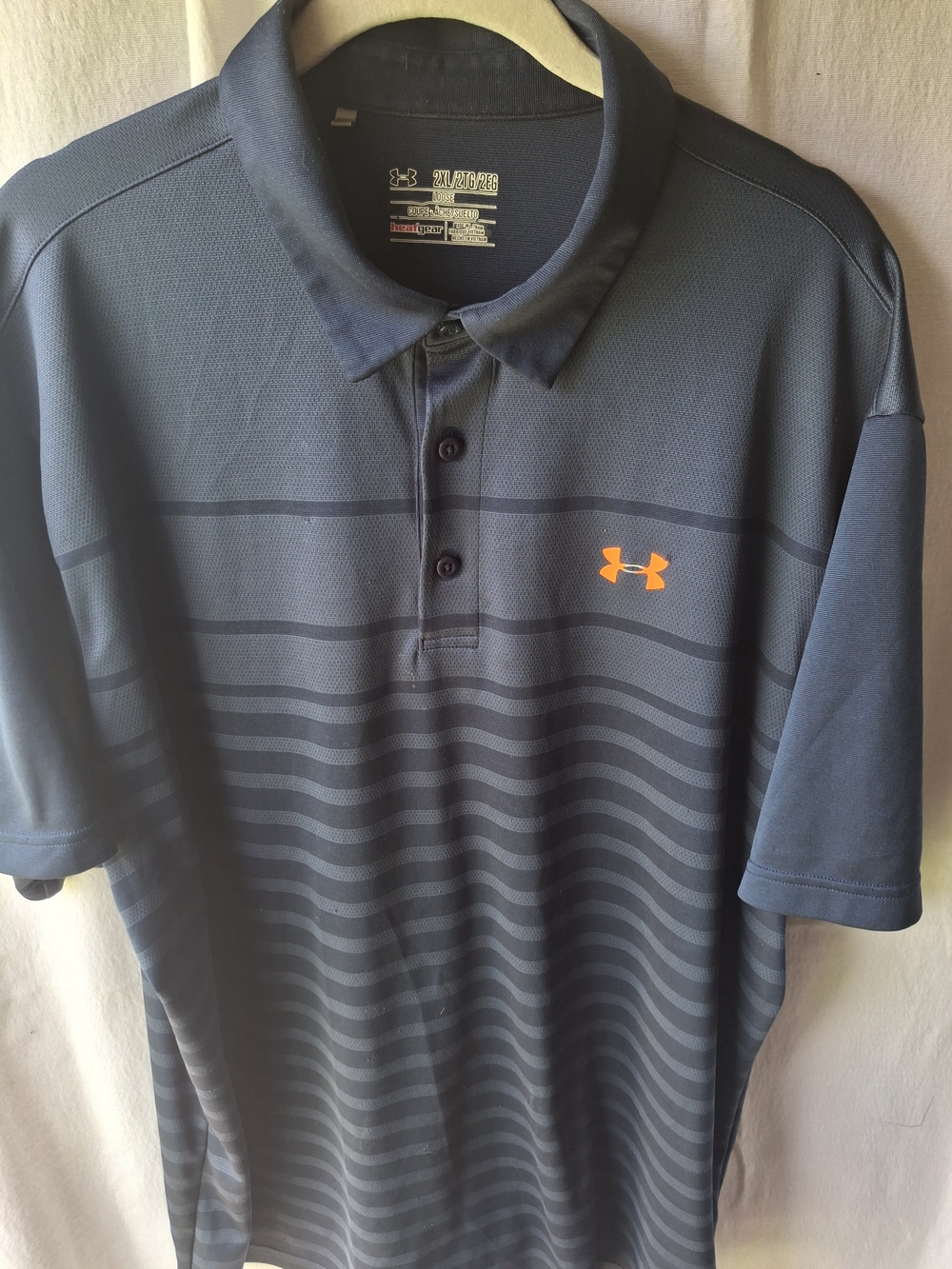 Under Armour Men’s Dark Blue Polo with Orange Logo
